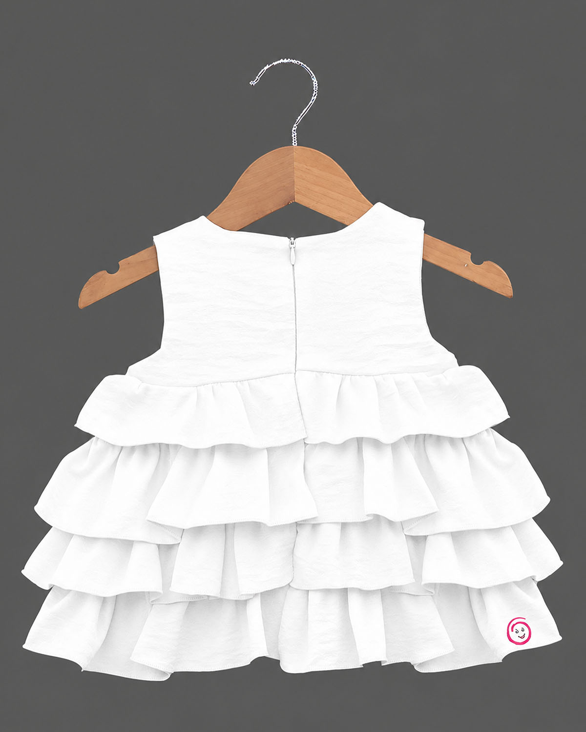 White tiered ruffled baby girl party wear frock with butterfly applique for birthdays, weddings, and special occasions