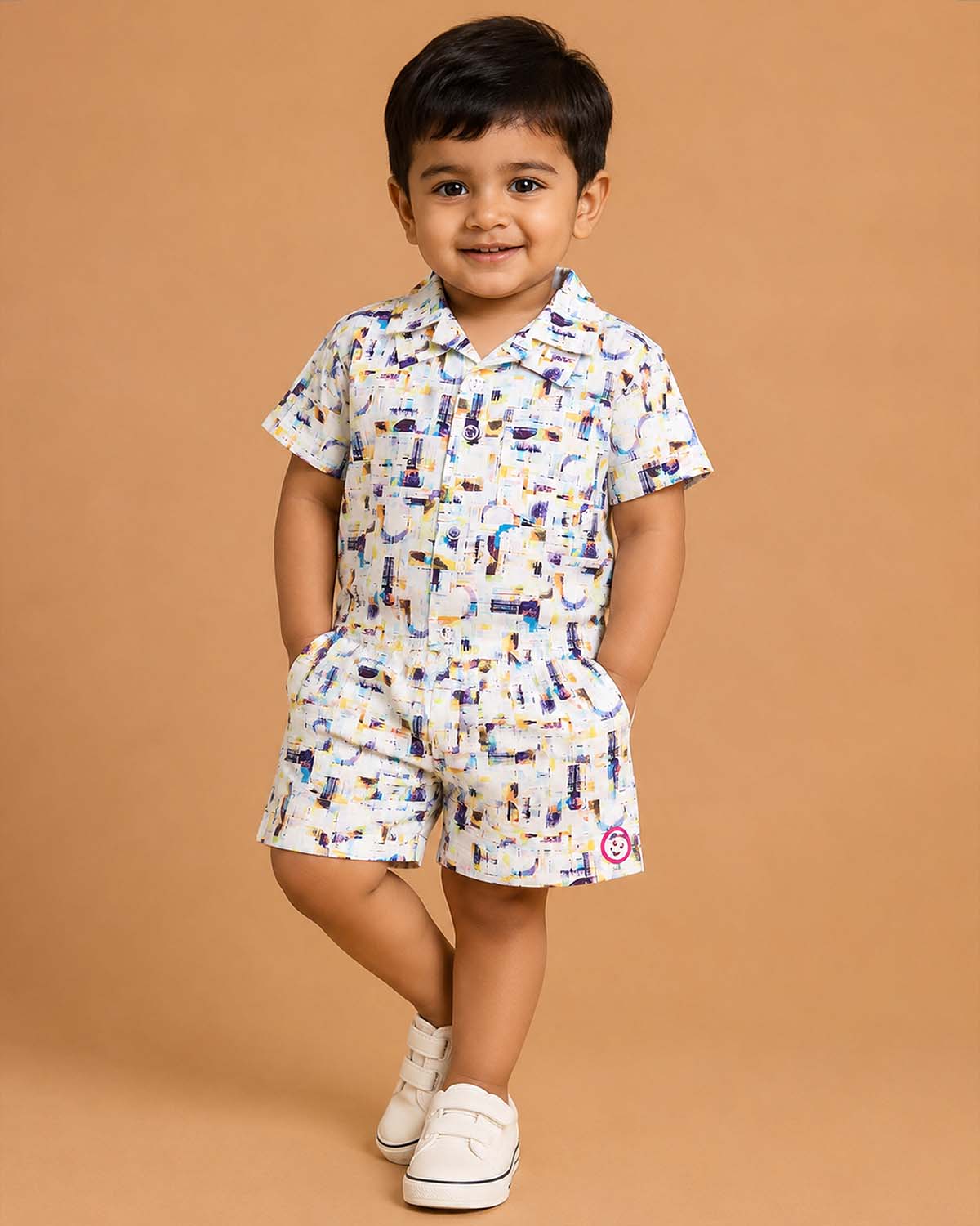 Modern multi-color abstract graphic art print muslin button-down shirt and matching shorts set for baby boys and toddler casual outdoor wear