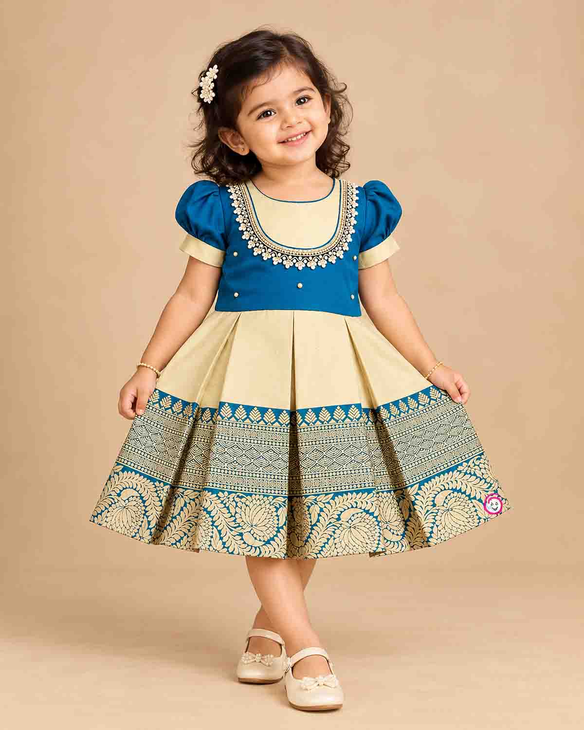 Toddler kids silk cotton frock ethic wear featuring embroidered round neck, puffed sleeves, and bordered skirt.
