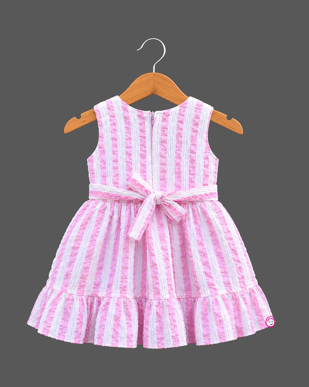 Baby girl seersucker stripe frock with bow detail for party wear and celebrations