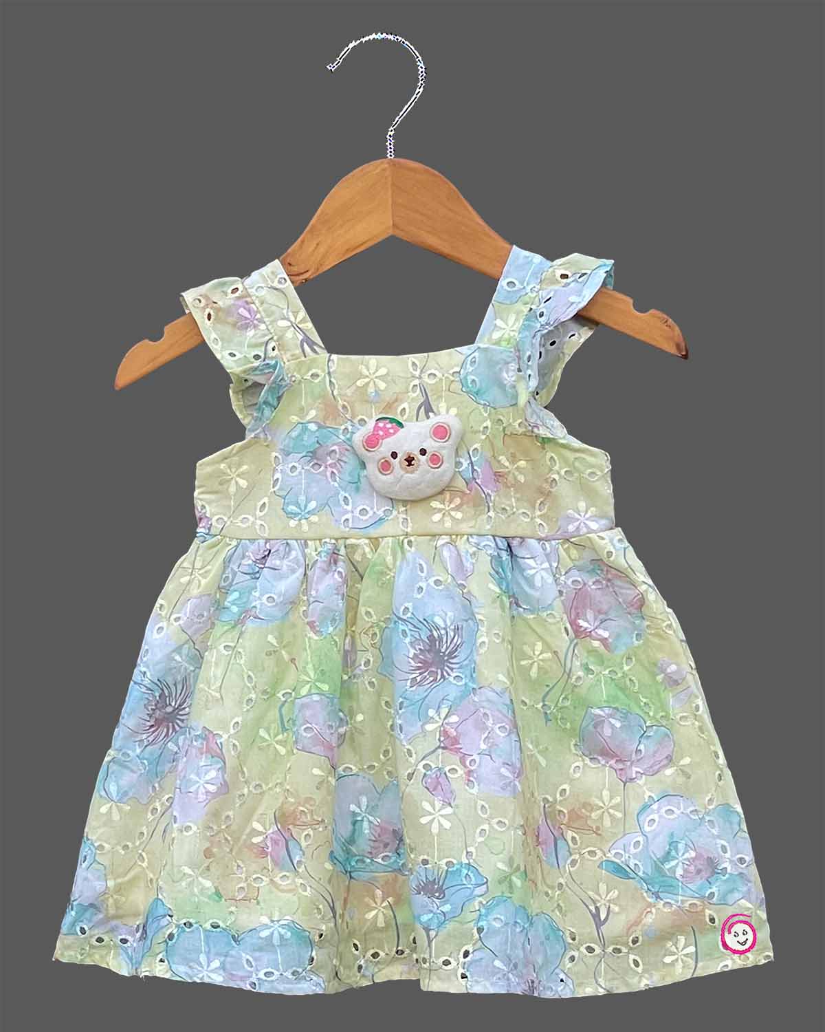 Pastel green schiffli floral casual frock for toddler girls with teddy patch
