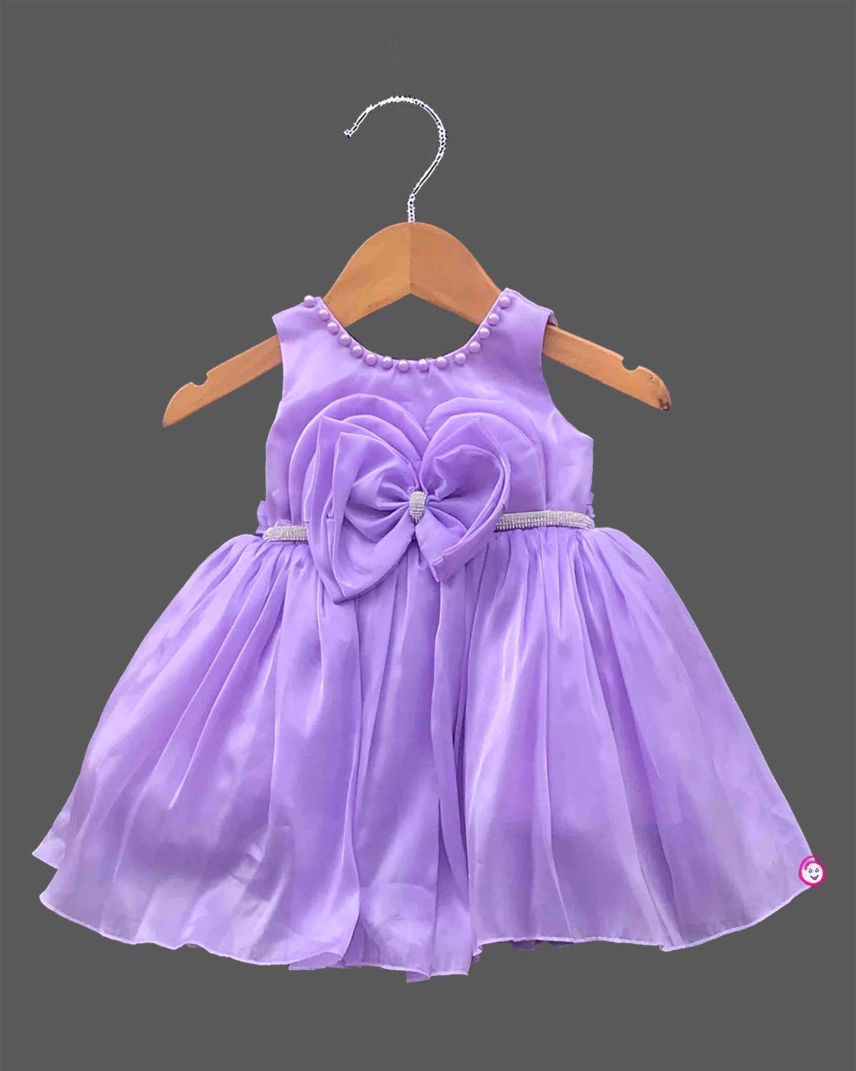 Infant satin party frock with statement bow and pearl neckline for baby girls