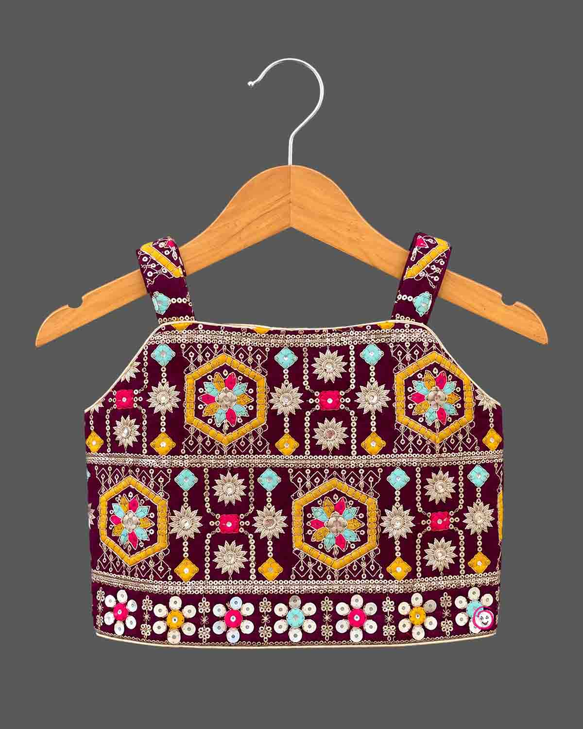 Geometric zari embroidered choli langa for kids set featuring mirror work choli and printed skirt