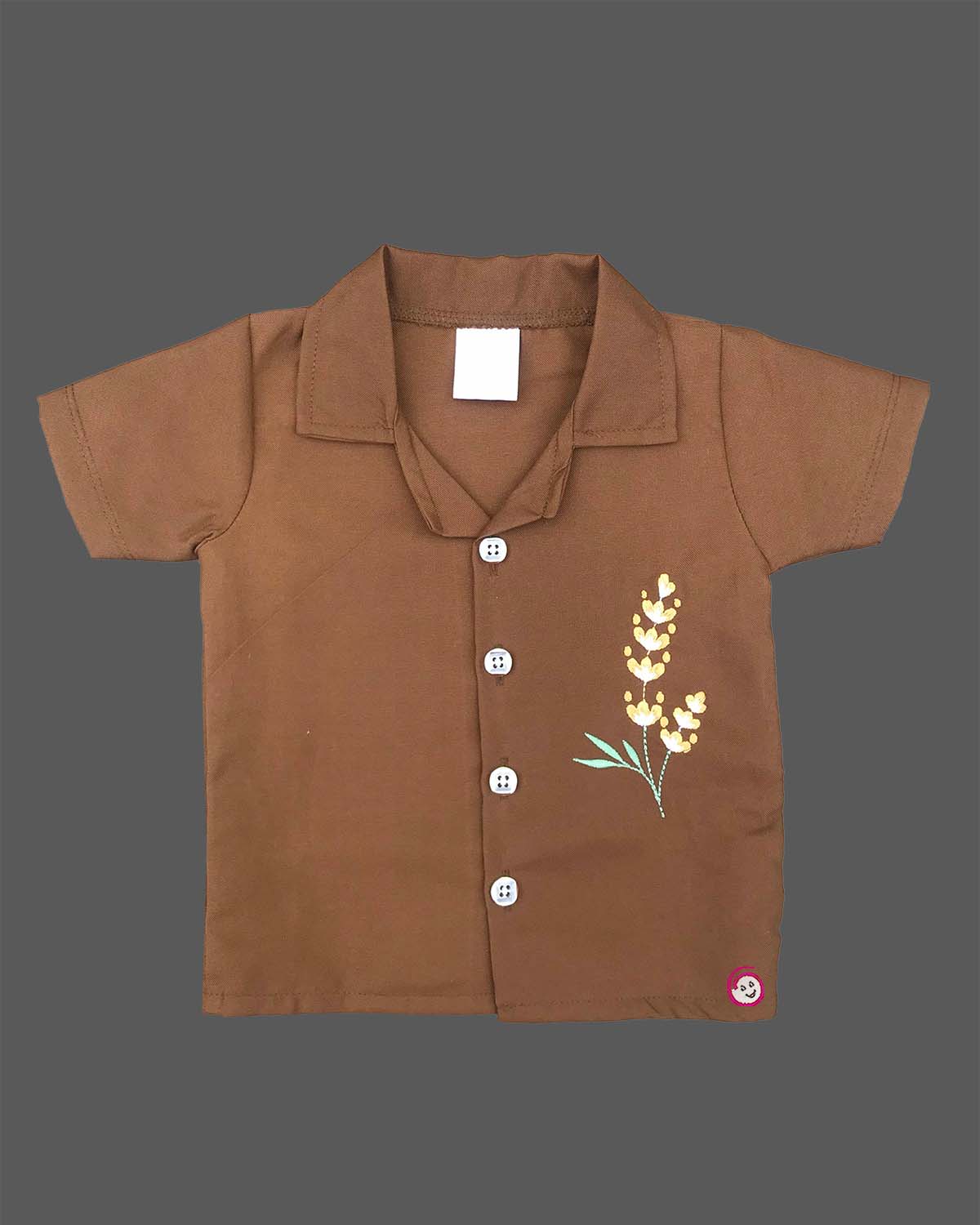 Infant casual outfit with button-down shirt and elastic waistband shorts for play.