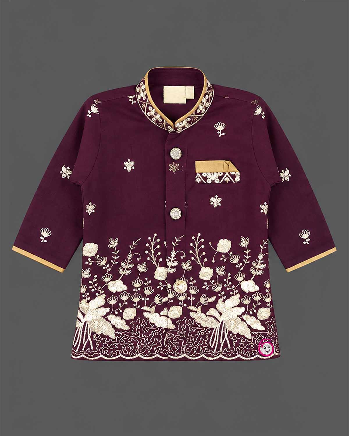 Little boy wearing purple and gold embroidered silk sherwani suit for weddings and festive functions