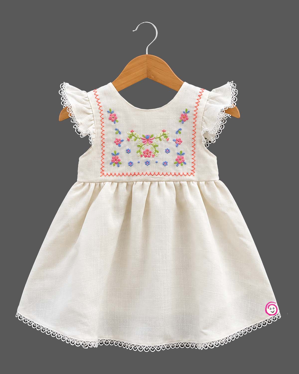 Frill sleeve organic frock with embroidered yoke and casual frock styling details.