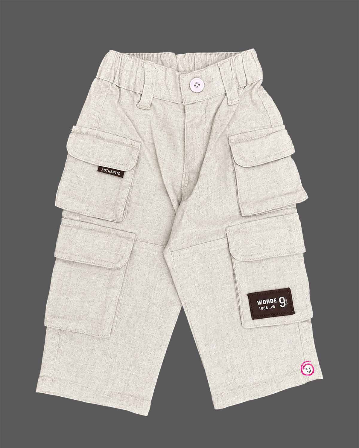 Smart casual cargo pant for young gentleman with multiple flap pockets, elasticized waist, button fastening, and logo badge patch.
