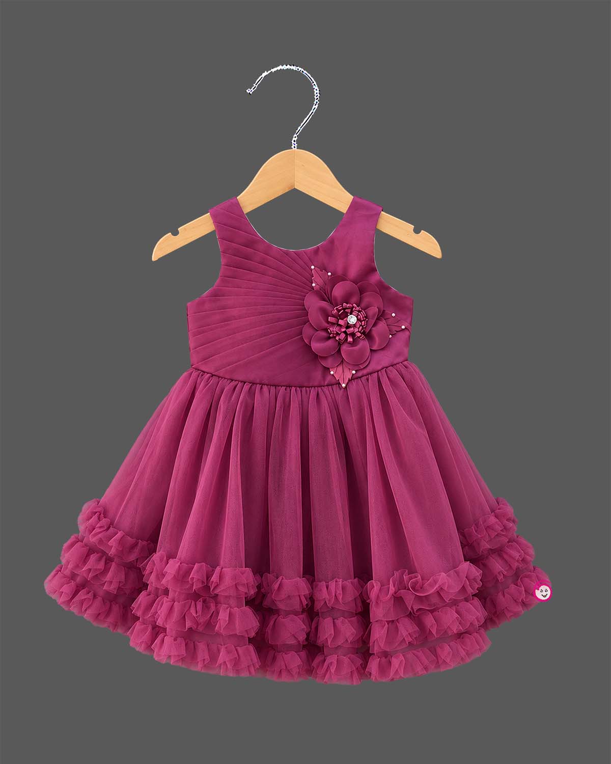 Toddler party frock with pleated diagonal bodice floral applique waist and tiered ruffle net flared skirt