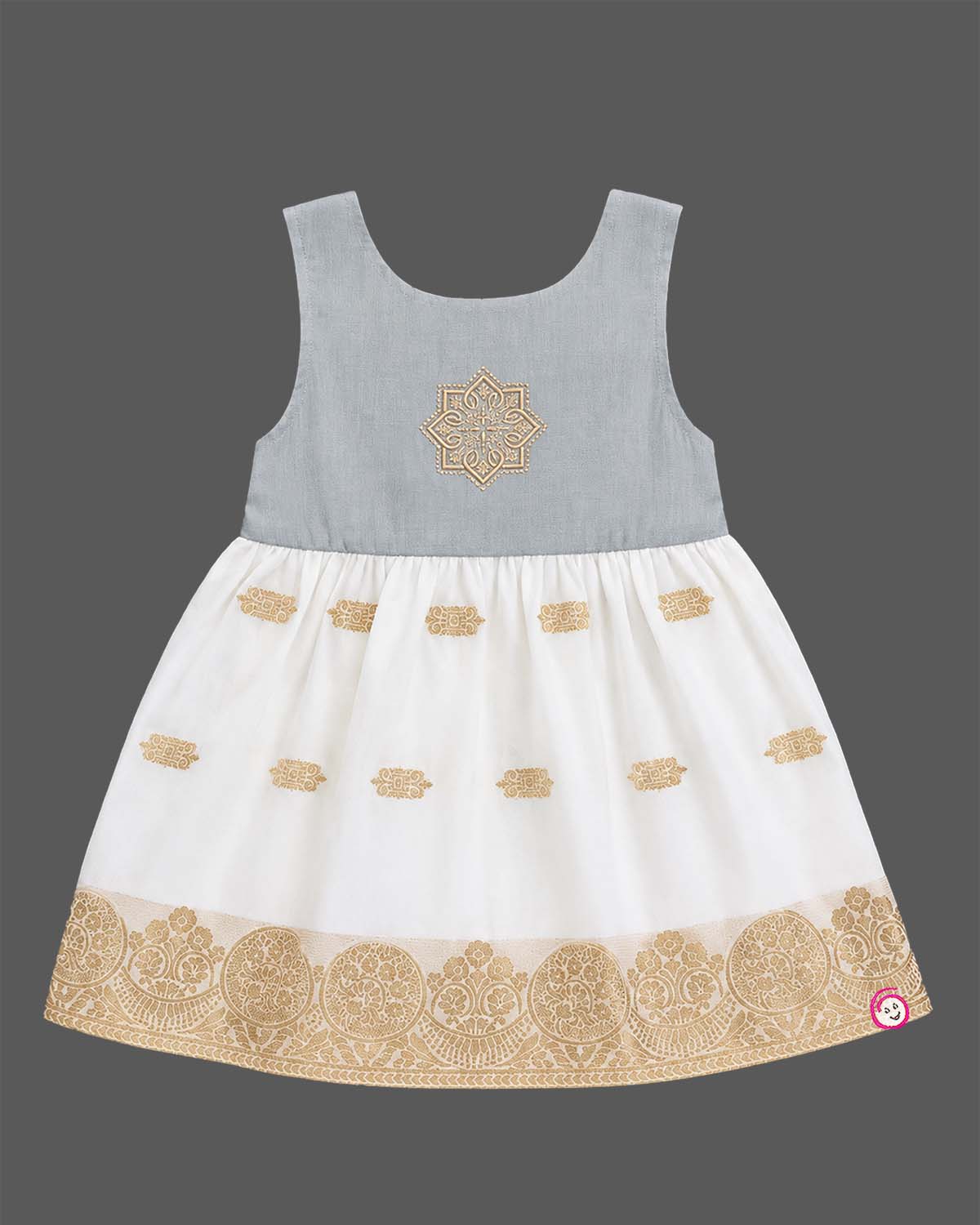 Sleeveless traditional festive attire for toddlers styled with metallic border motifs and chest embroidery.