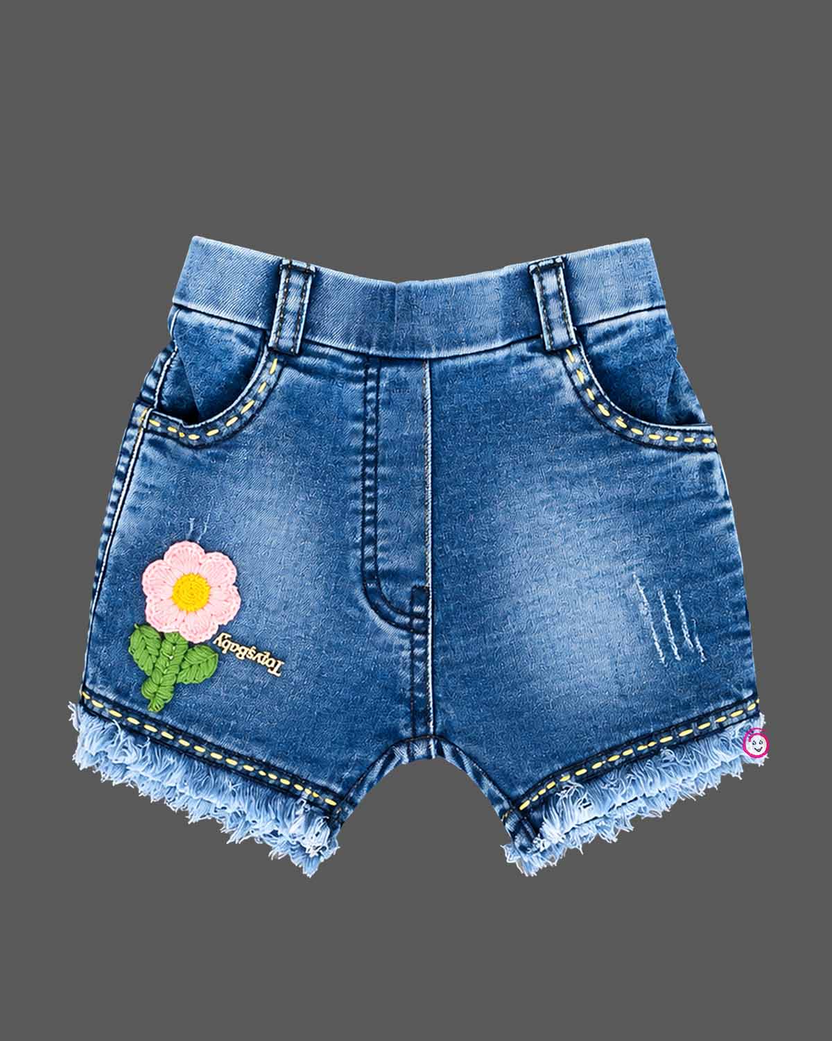 kids party wear outfit featuring crochet lace top and denim shorts with floral appliques