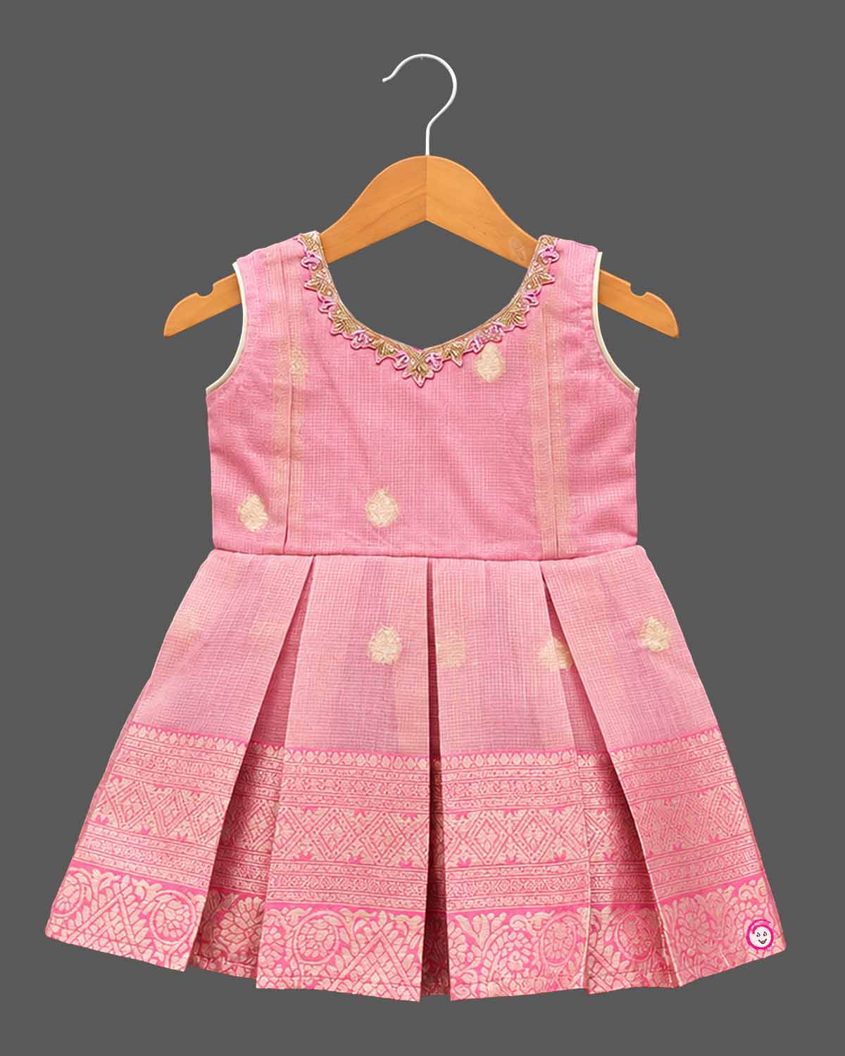 Toddler pleated cotton silk frock featuring ornate neckline embroidery and flared silhouette.