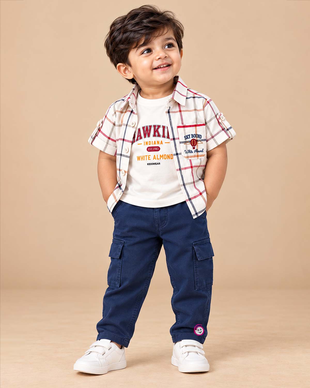 Grid plaid collared shirt with roll tab sleeves paired with utility cargo pants for boys shirt and pant set.