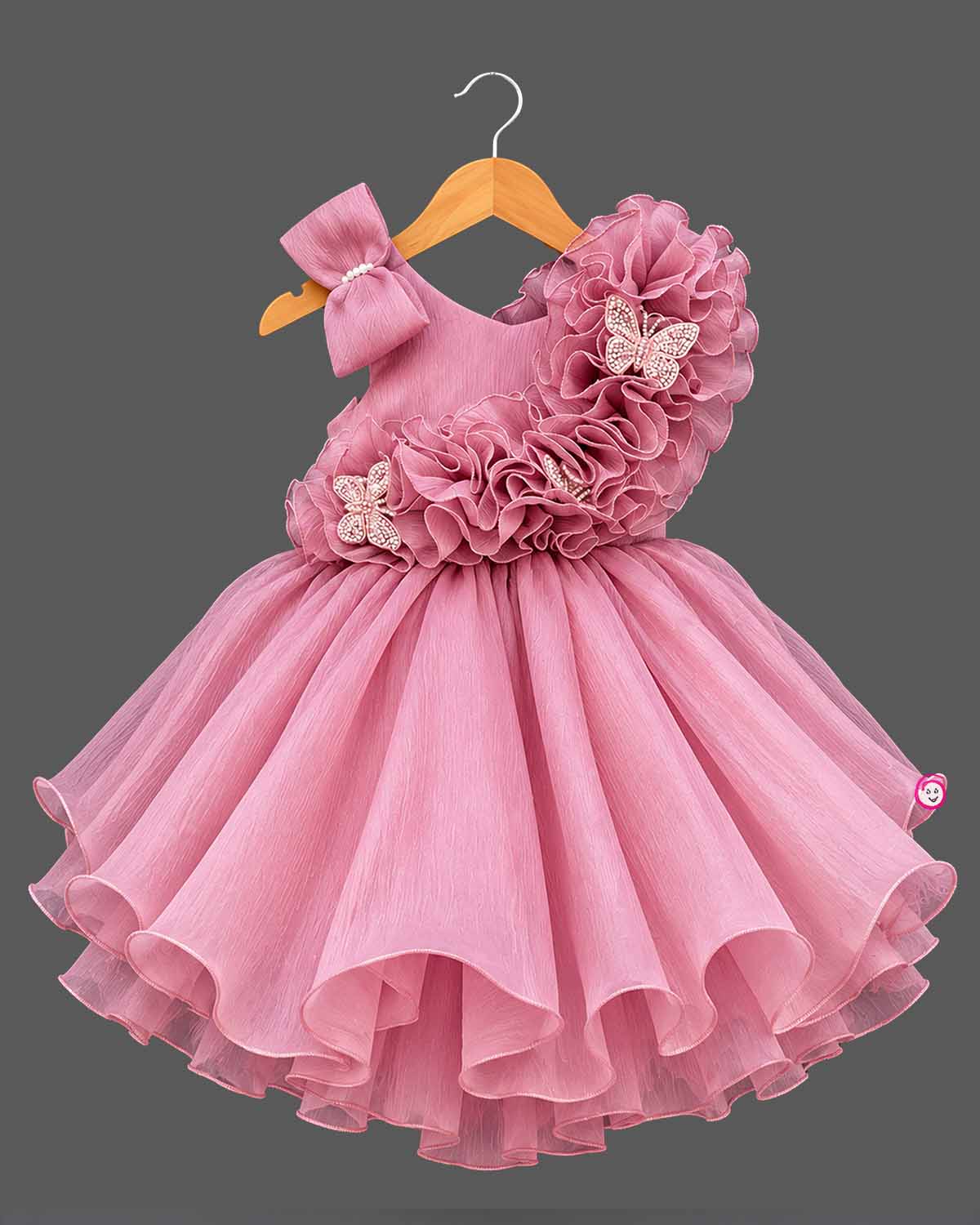 Toddler girl ruffled organza party frock featuring asymmetrical butterfly ruffles and matching bow headband