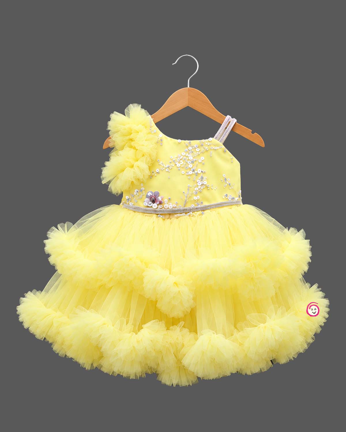 Voluminous baby party wear dress with Party frock train and floral embellished bodice.