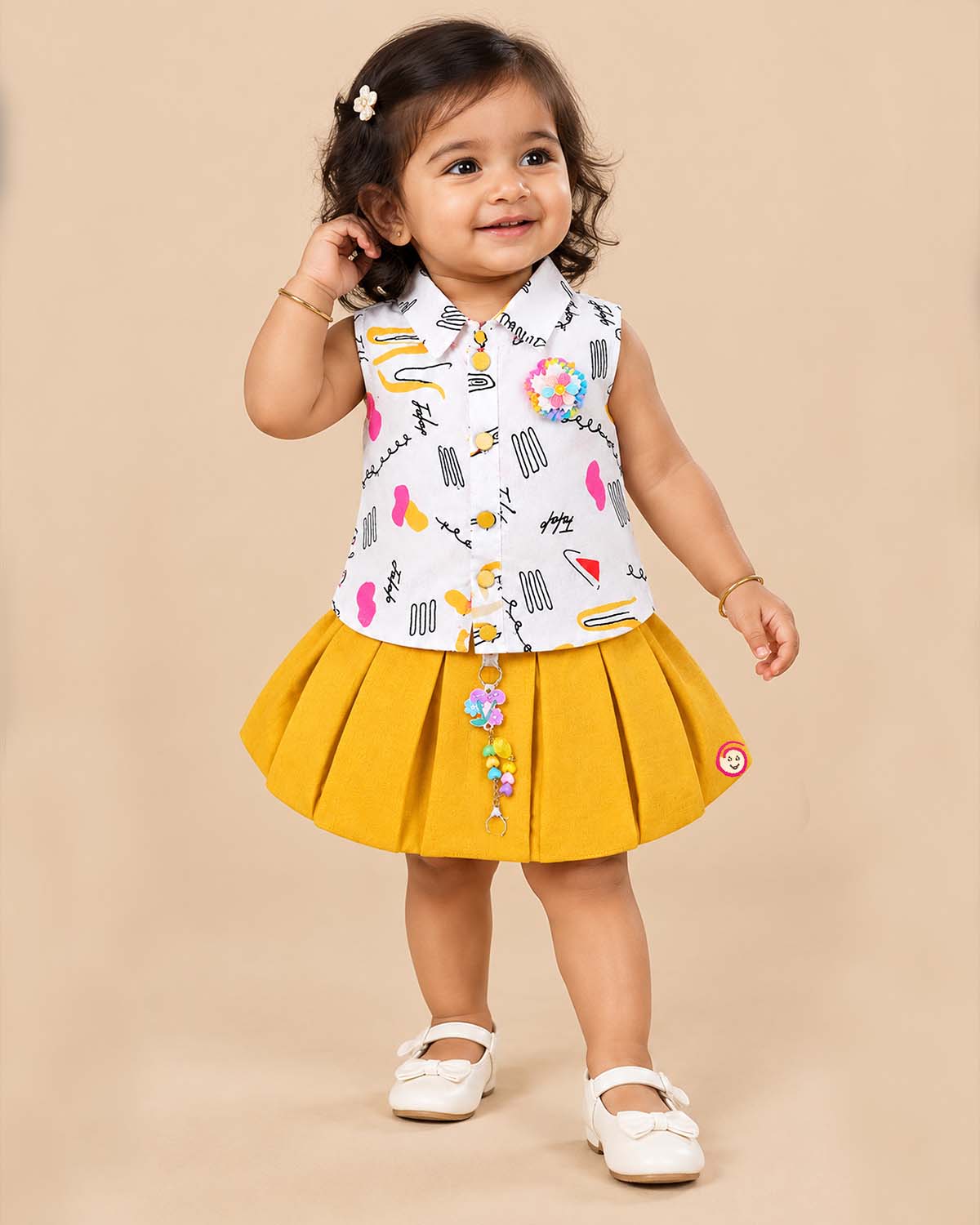 Sleeveless printed top paired with a pleated skirt baby western wear dress for girls