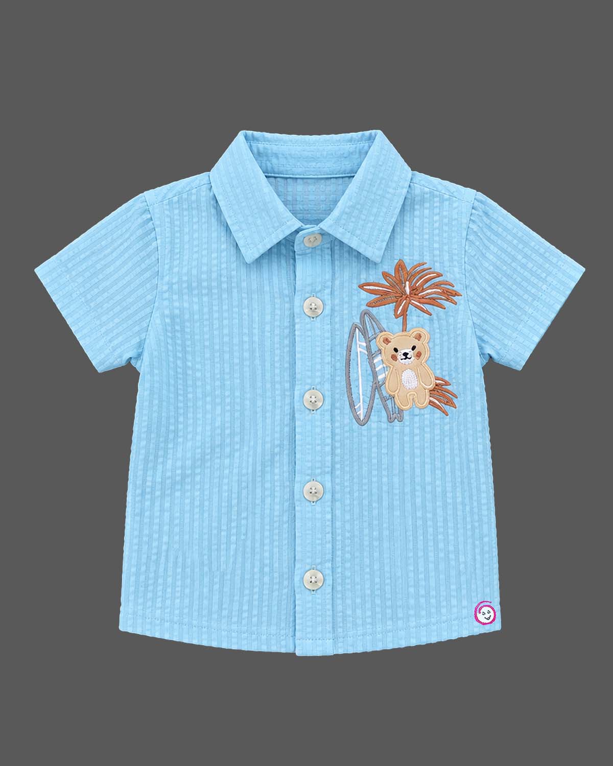 Co-ord set for baby boy featuring button-down collar shirt and short set with embroidered bear applique.
