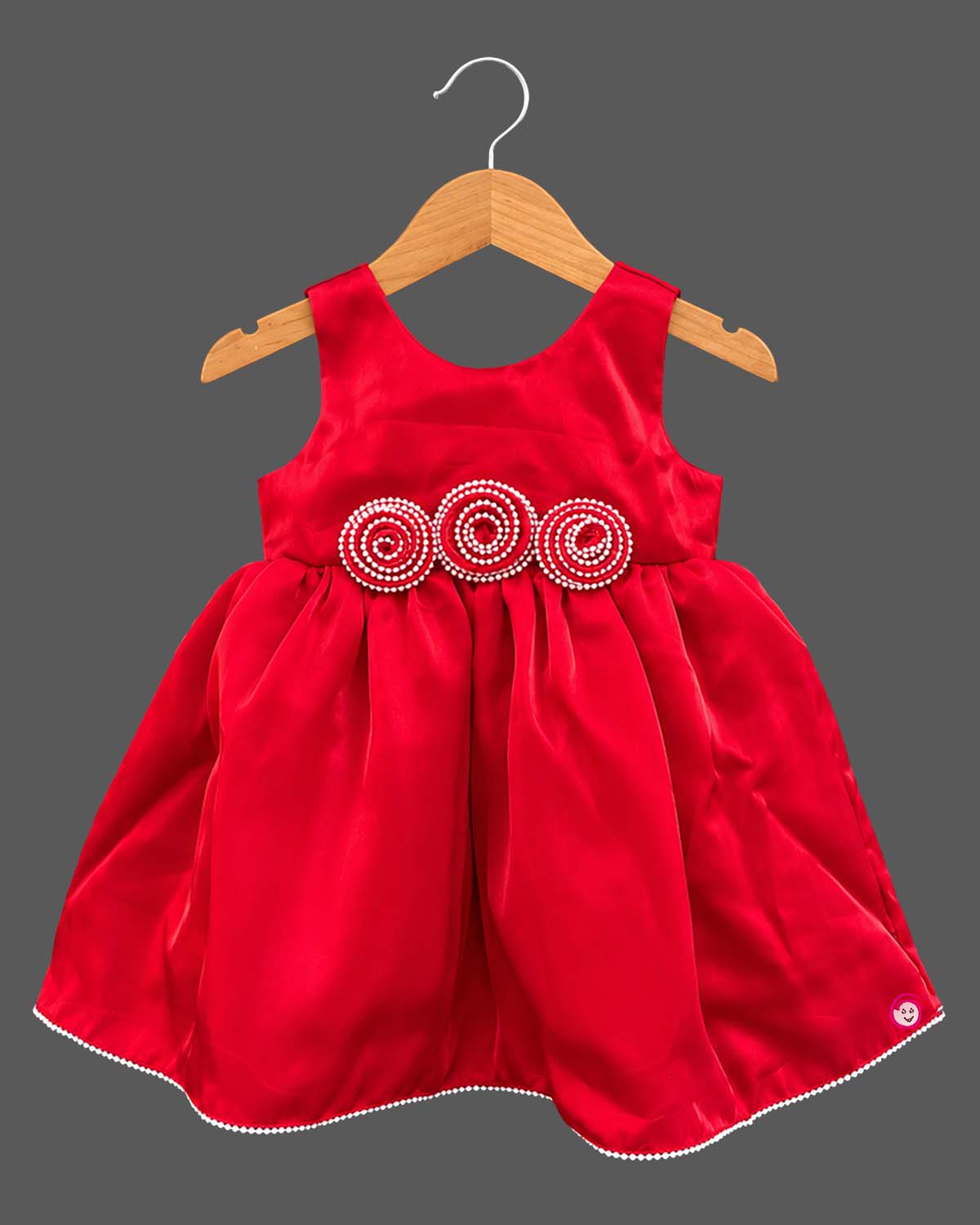 Sleeveless satin party frock with waist accents and kids party wear details.