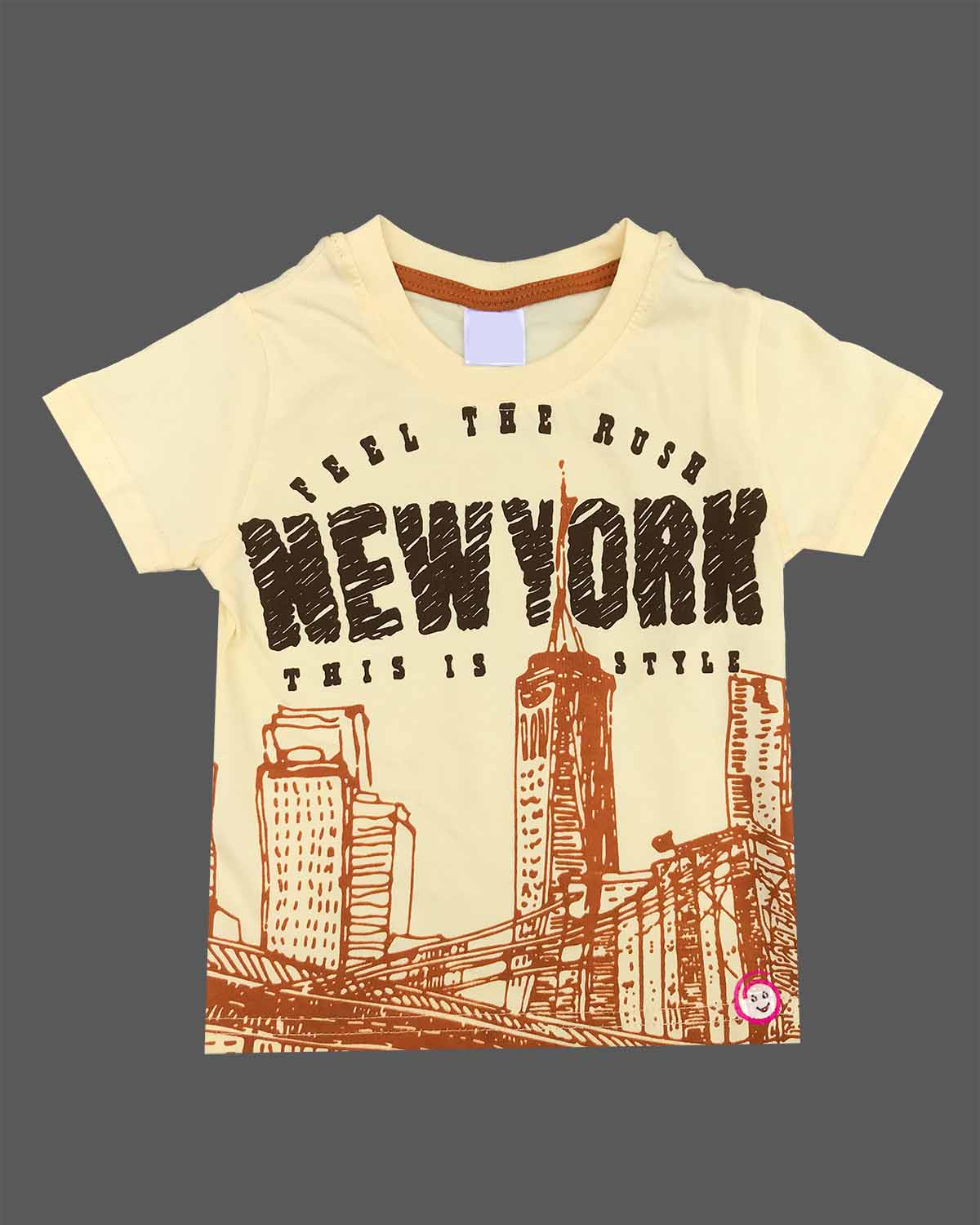 Light yellow graphic t-shirt with New York cityscape print and rust orange elasticated shorts baby boy top and shorts set for summer vacations, playdates, and park outings
