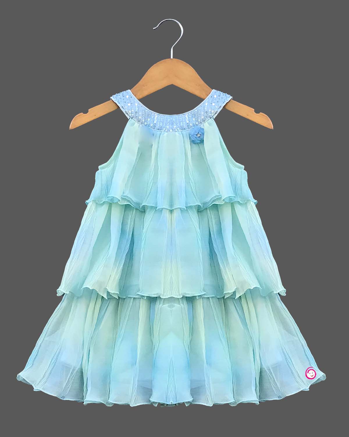 Girls sleeveless tiered chiffon midi party dress with sequin embellished scoop neckline and ruffled layers.