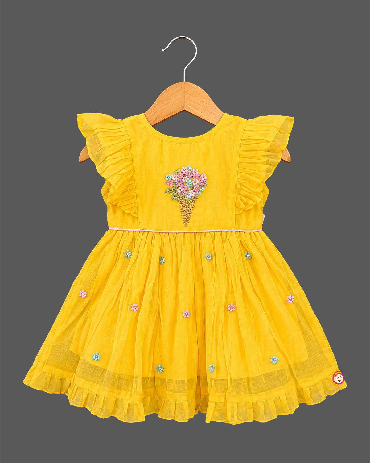 Hand embroidered pattu frock featuring floral applique bodice and frill sleeves