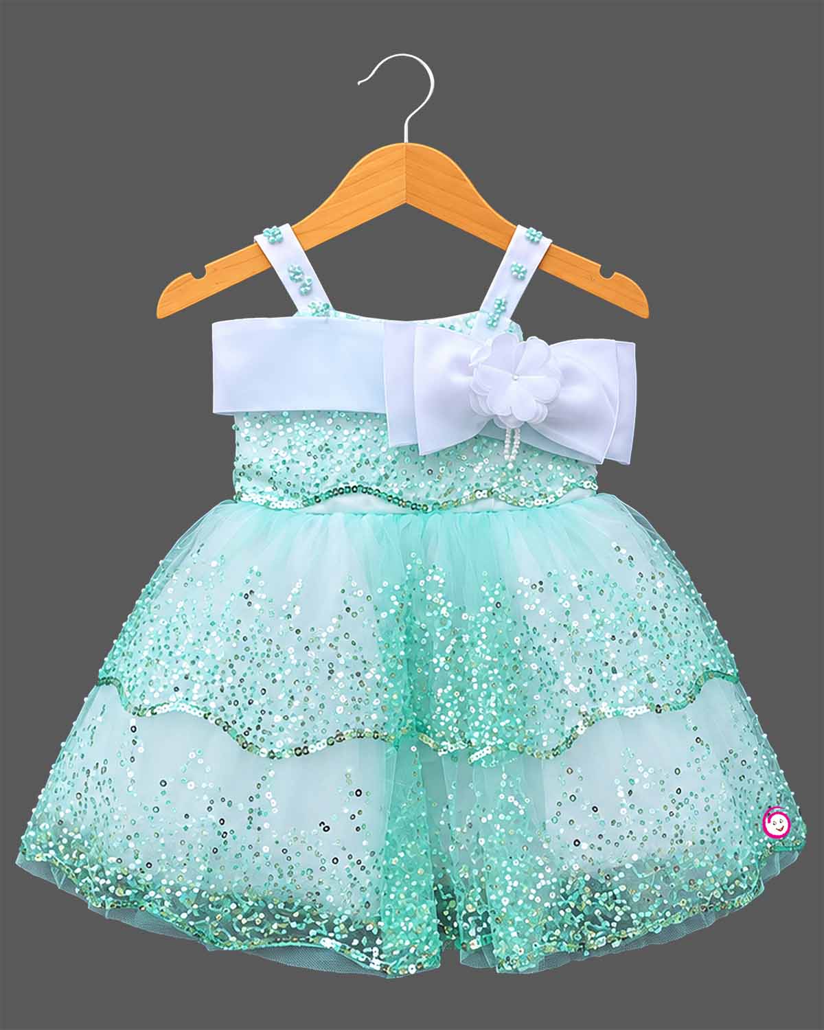 Girls sequin tiered tulle party frock with sleeveless satin shoulder straps and front bow accent under 120 chars.