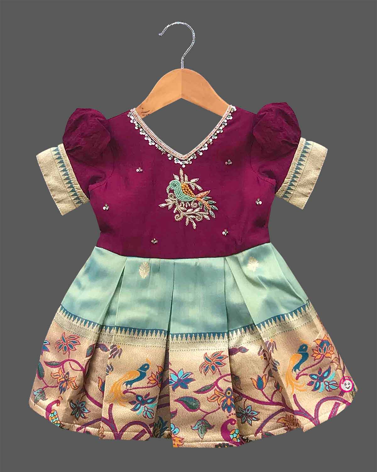 Little princess art silk traditional frock featuring peacock embroidery and zari woven hemcś