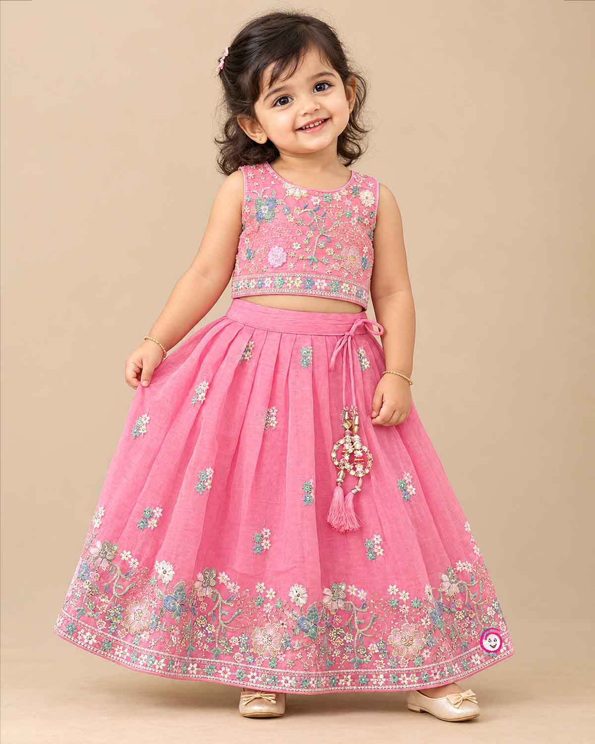 Floral embroidered lehenga choli for kids featuring flared skirt and net dupatta