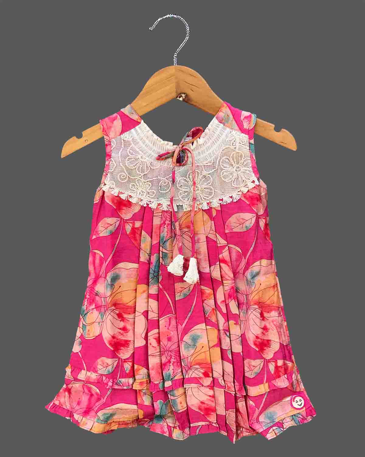 Infant floral printed frock with lace yoke insert and tassel tie up for birthday party and summer outing
