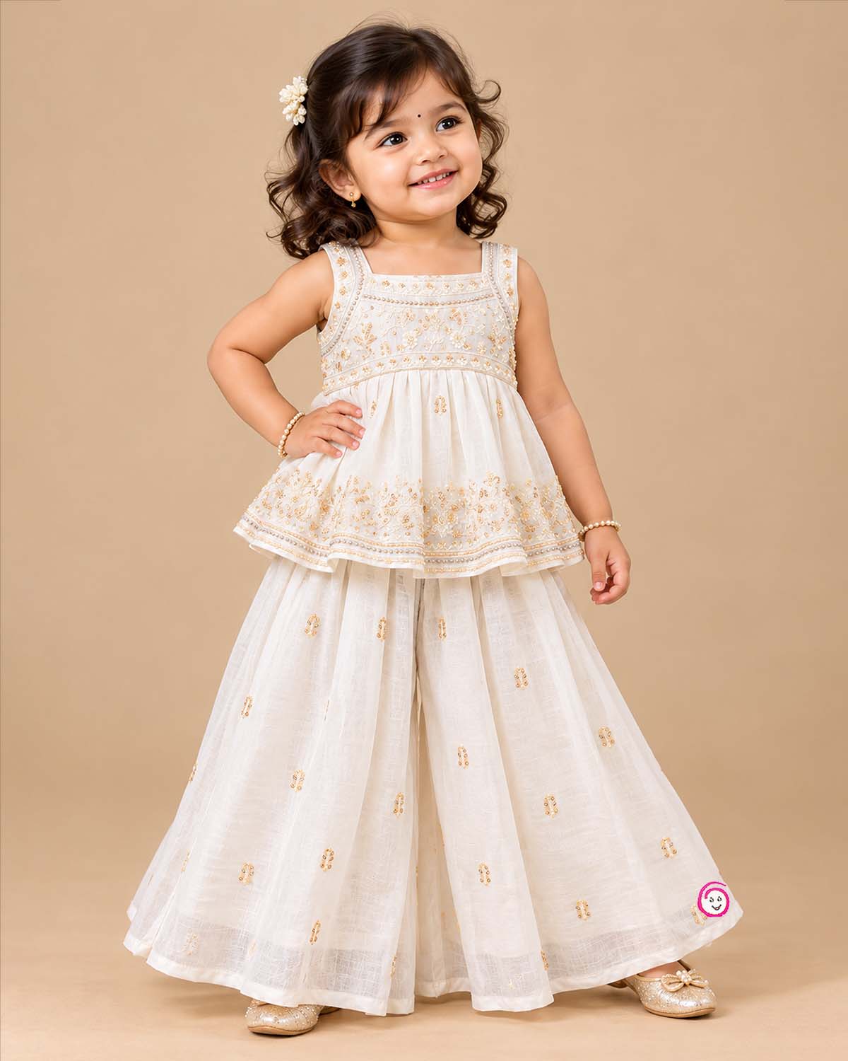 Sleeveless kurti for kids featuring floral embroidery, paired with wide-leg palazzo pants and gold-bordered dupatta.