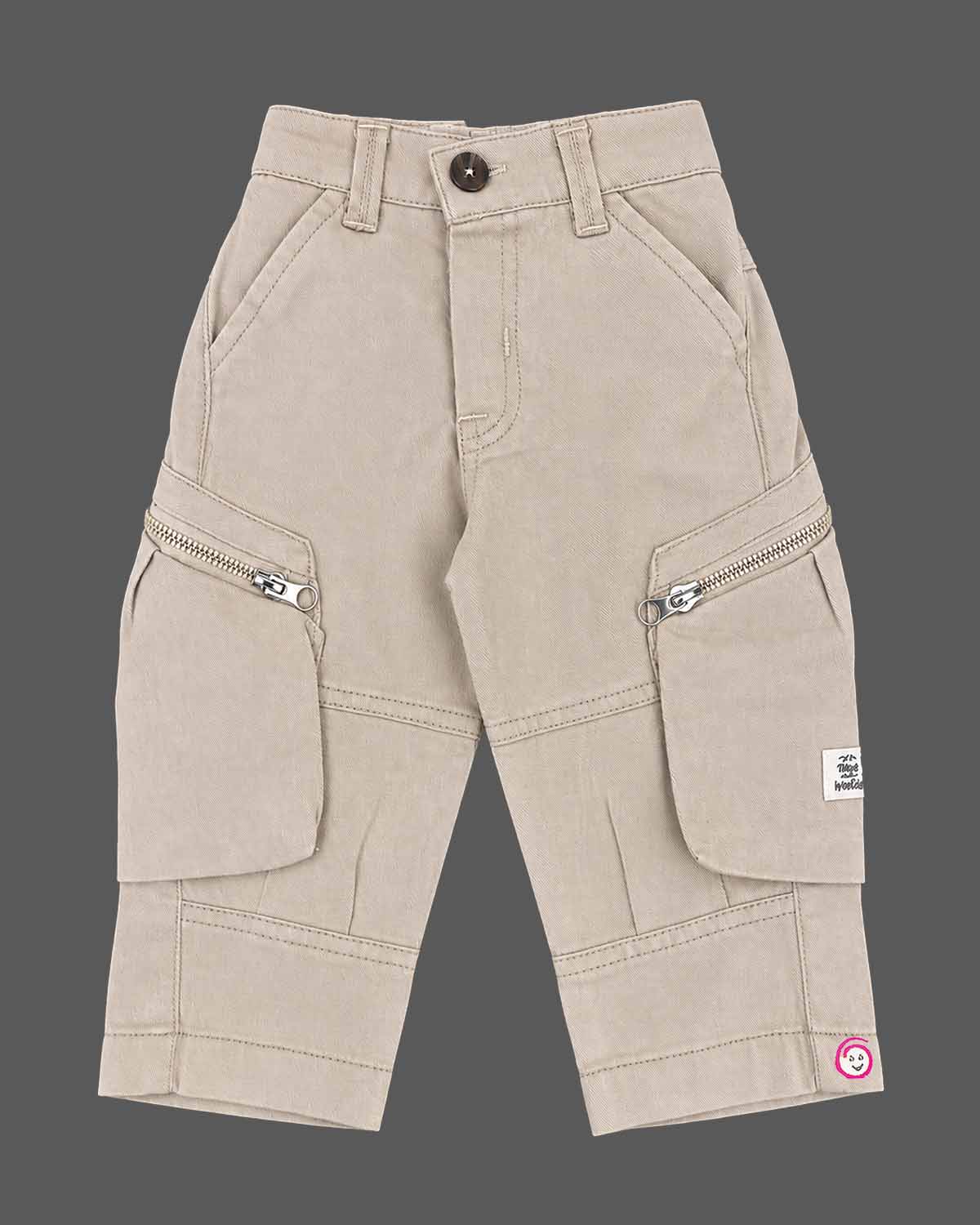 Detailed view of party wear for boys featuring denim button shirt with graphic prints and cargo Pant.