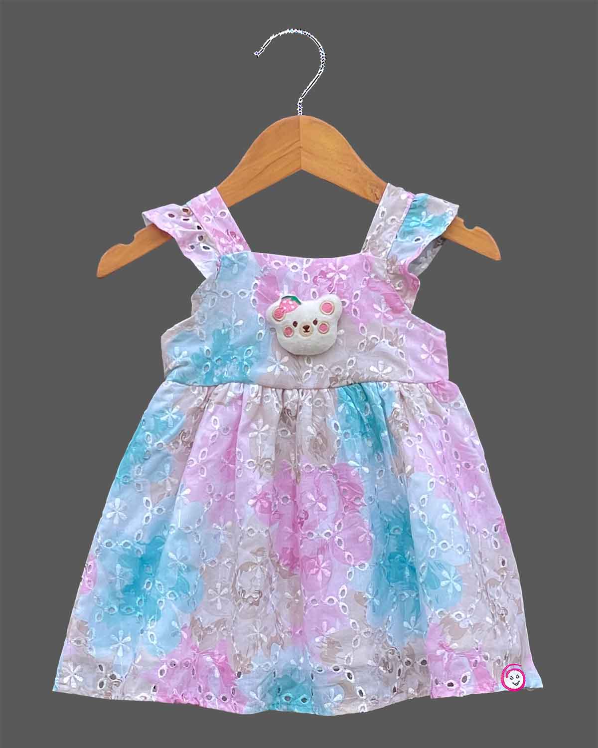 Baby girl schiffli embroidered cotton casual frock with ruffle shoulder straps and chest patch detail