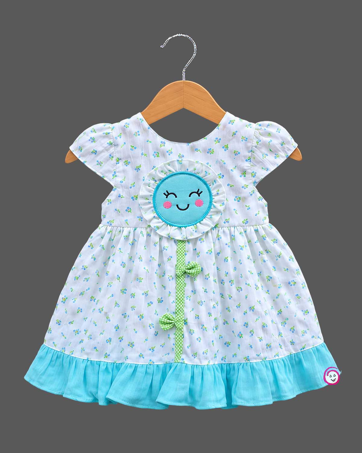 Toddler sun-applique casual frock featuring a tiny floral print and cap sleeves