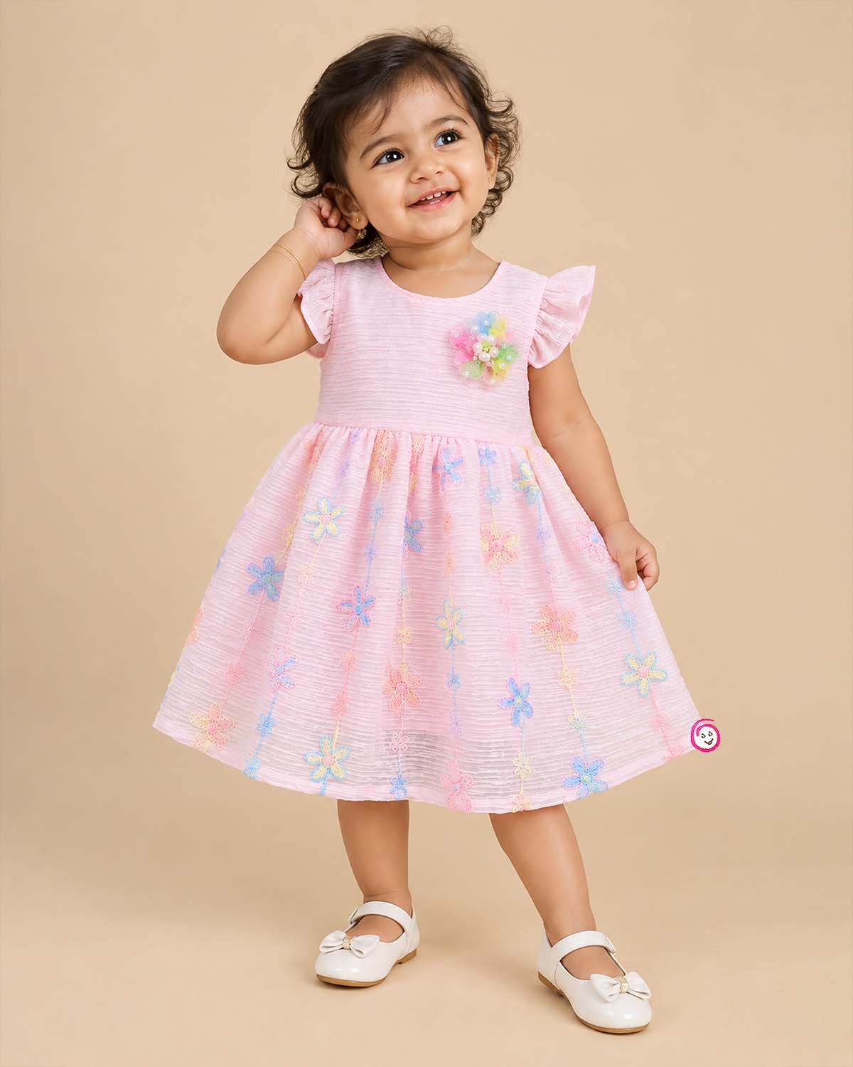 Infant textured floral casual frock with flutter sleeves and chest brooch detail