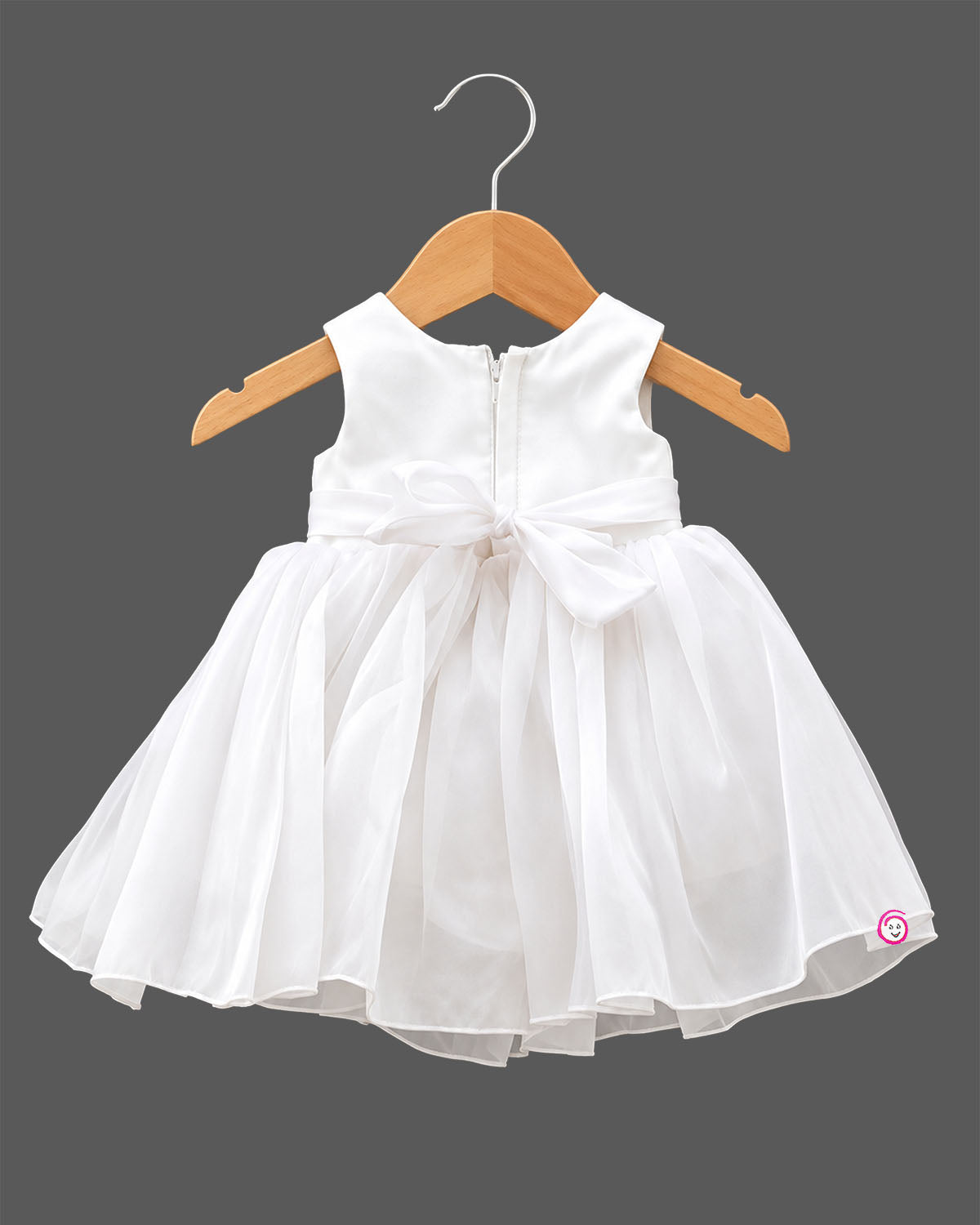 Infant girl sleeveless party frock with large front bow, beaded waistband, and pearl embellished neckline for special occasions