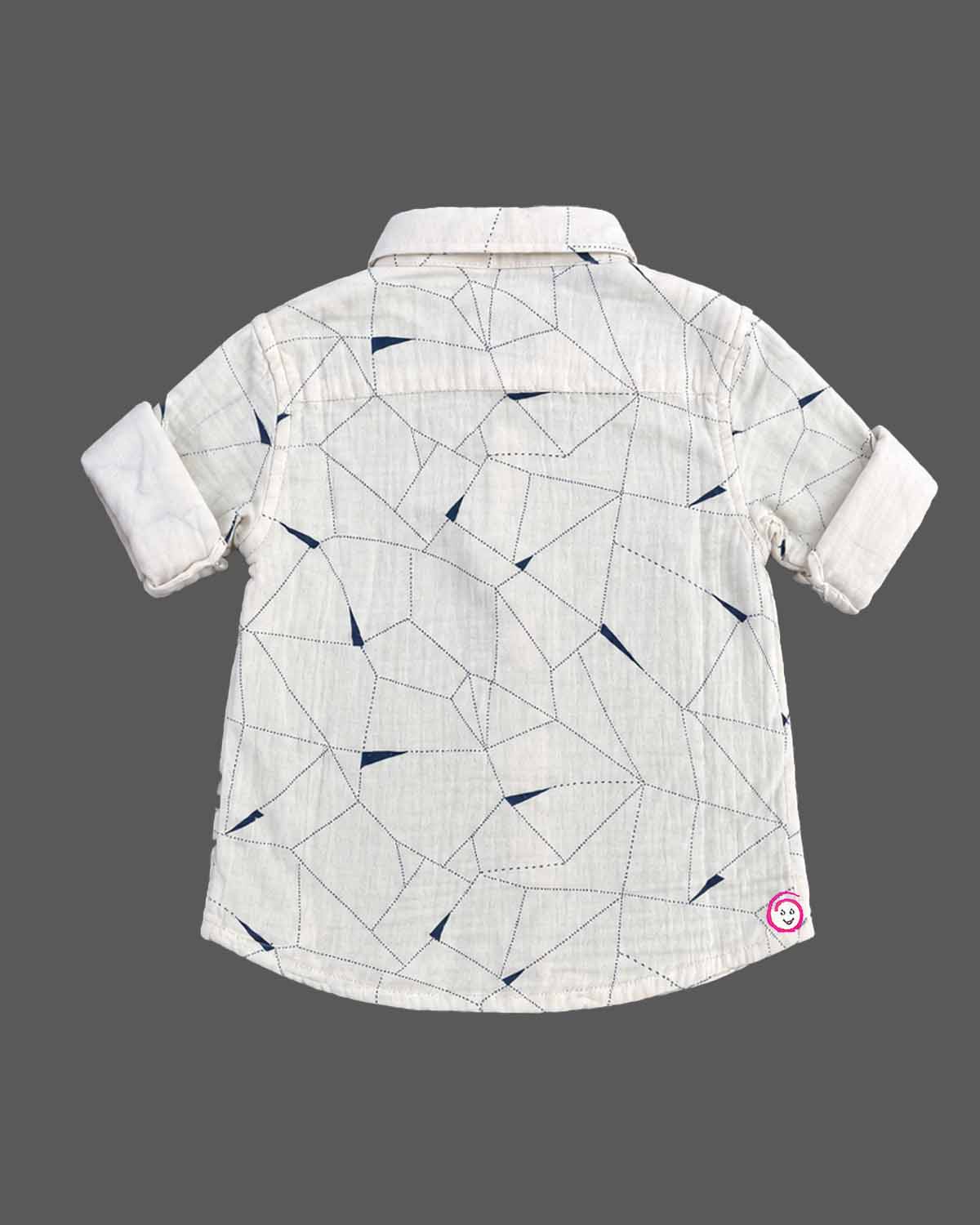 Boy button-down shirt with geometric linear pattern and roll-up sleeves for party wear for boys.