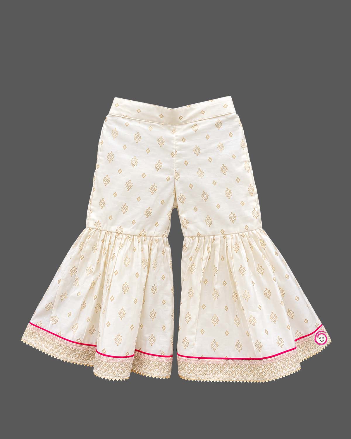 Sleeveless printed short kurta and flared tiered kids sharara set with gota trim details.