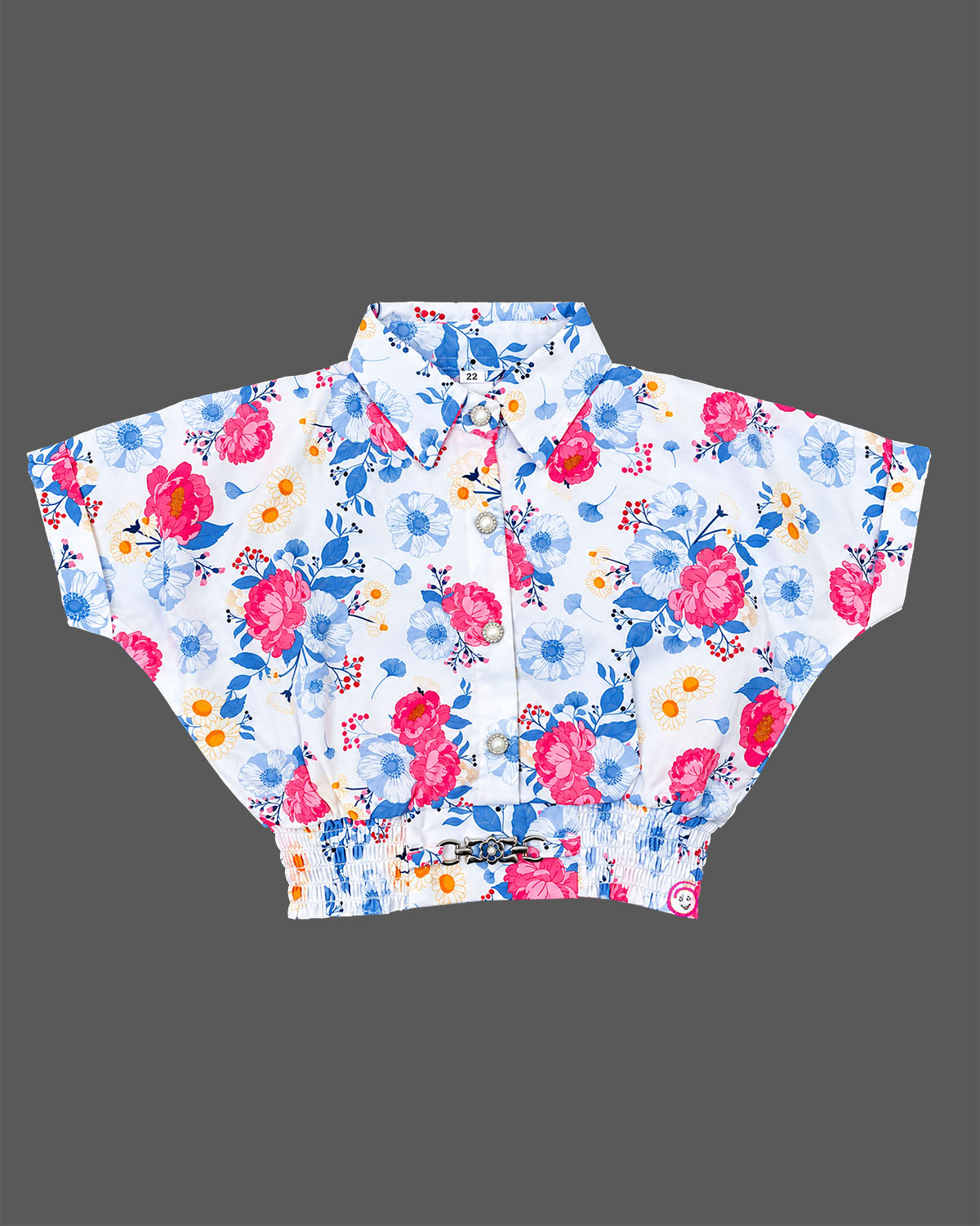 Floral shirt and buttoned wrap skort set styled as a baby party wear dress for girls