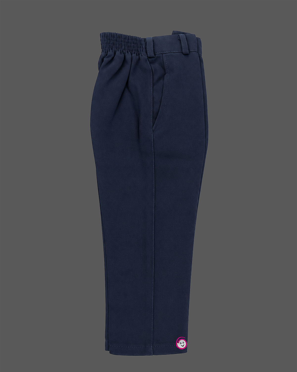 Blue boys formal suit with silver shoulder embroidery, white shirt, and bowtie