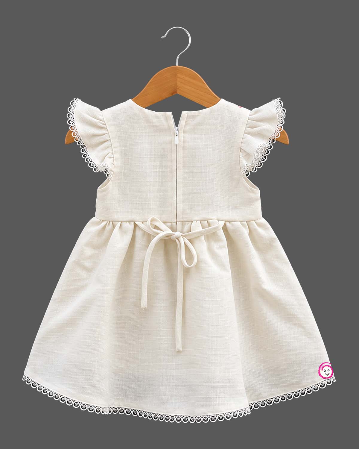 Frill sleeve organic frock with embroidered yoke and casual frock styling details.