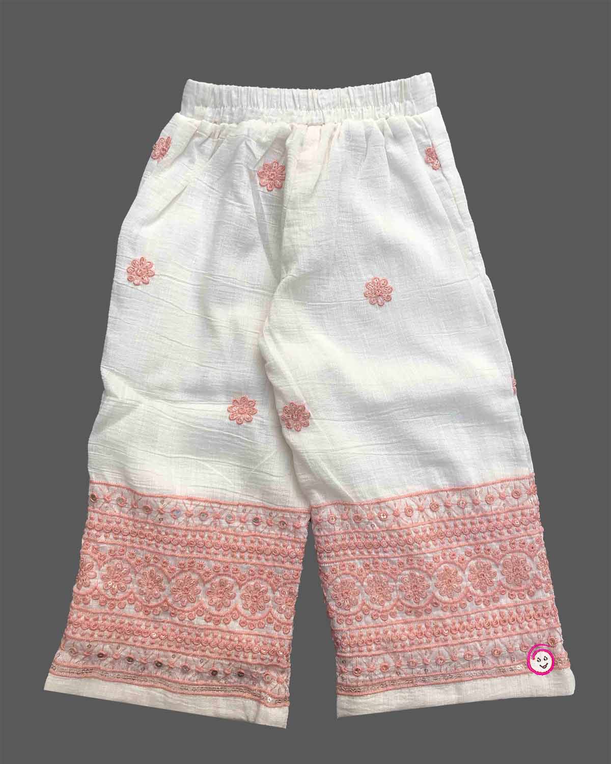 Baby girl embroidered cotton top and pant set featuring shoulder straps and matching wide leg pants for festive occasions