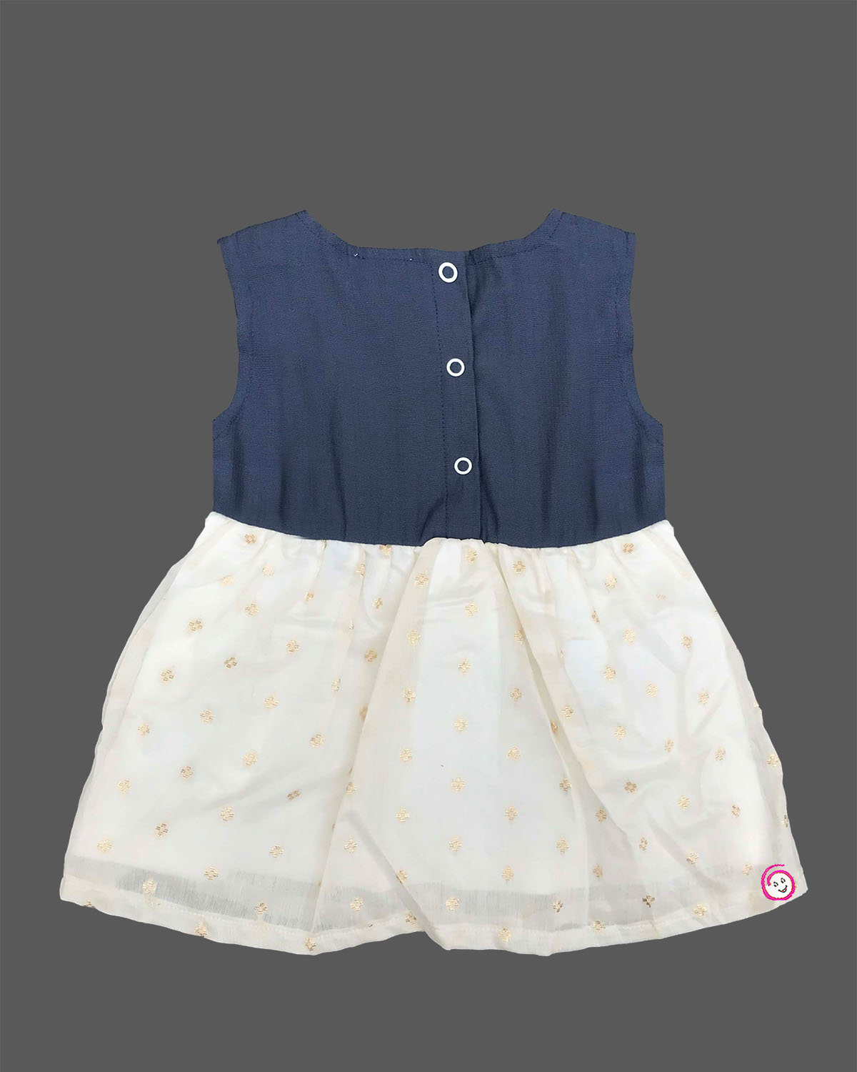 Traditional festive frock for baby girls featuring a sleeveless yoke with golden embroidery and a shimmering tissue skirt, perfect for Onam celebrations.