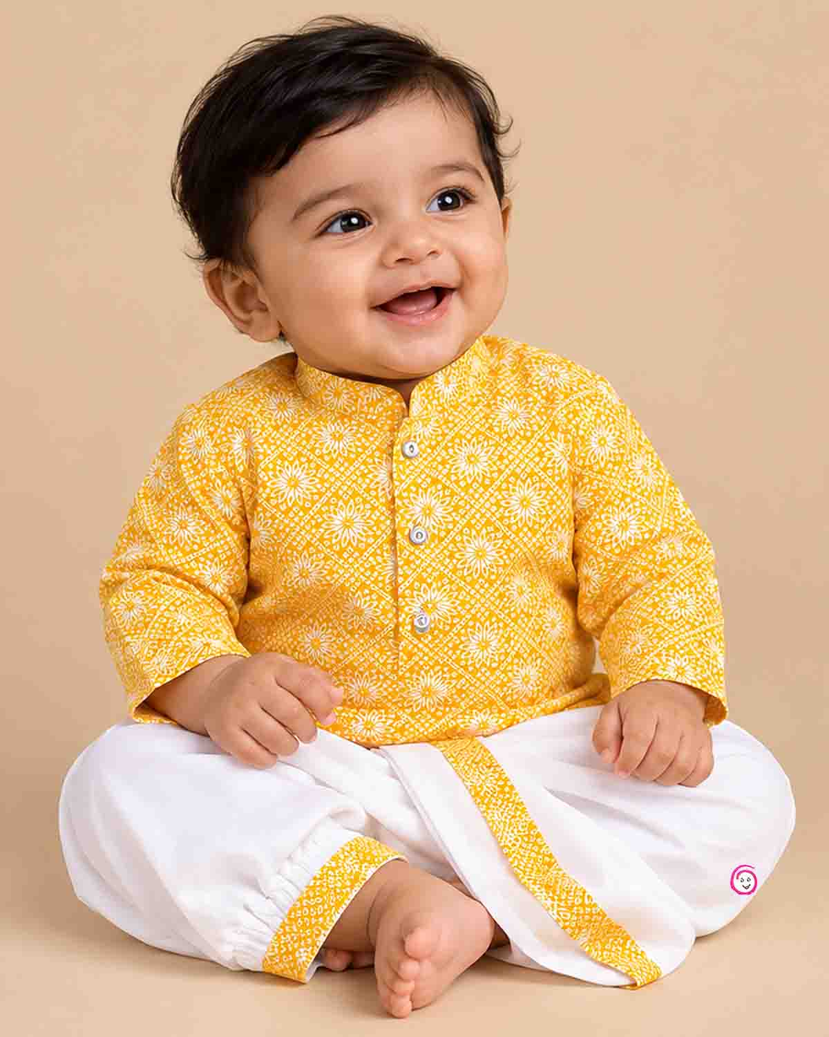 Baby boy printed ethnic kurta and dhoti pant set with mandarin collar and front placket buttons for pooja celebrations.