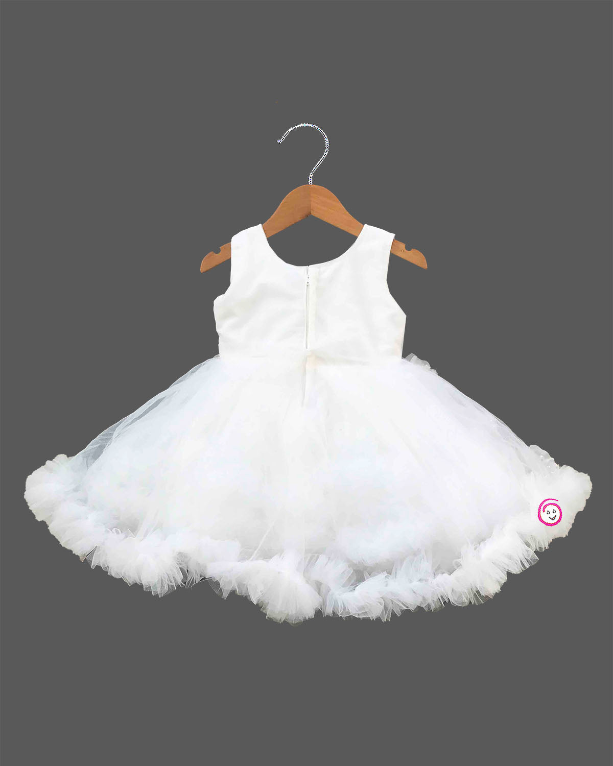 Toddler white net party gown with sequin bodice and bow applique