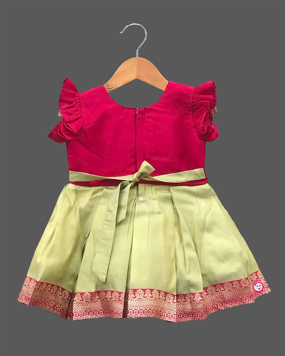 Little girl silk traditional frock with embroidered neckline ruffle sleeves and woven zari border for ethnic celebrations