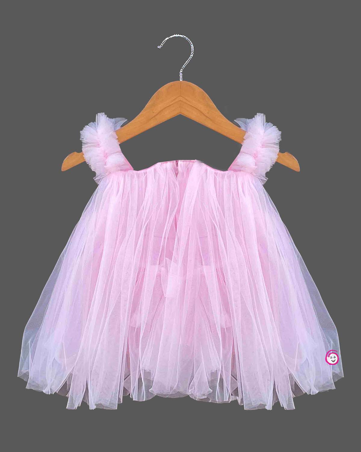 Layered tulle flared silk frocks for baby girl featuring ruffled shoulder straps and dangling floral appliques.