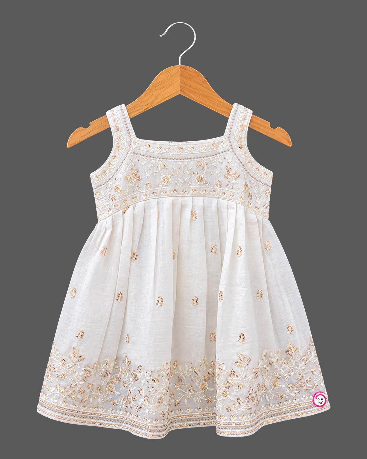 Sleeveless kurti for kids featuring floral embroidery, paired with wide-leg palazzo pants and gold-bordered dupatta.