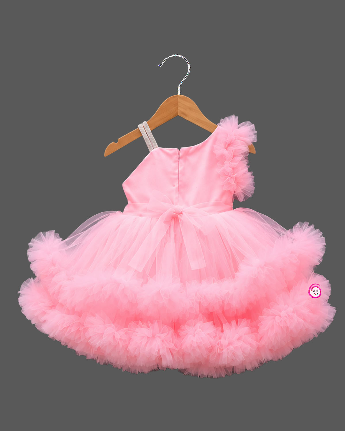 Tiered ruffle high-low silk frocks for baby girl featuring asymmetrical shoulder frills and sequin embroidery.
