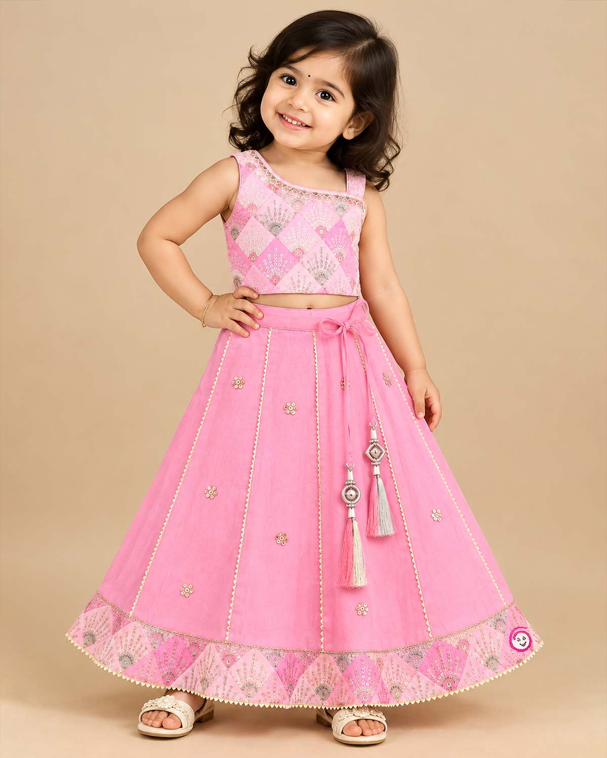 Toddler girls embroidered choli lehenga set with tassel drawstring and flared hem border.