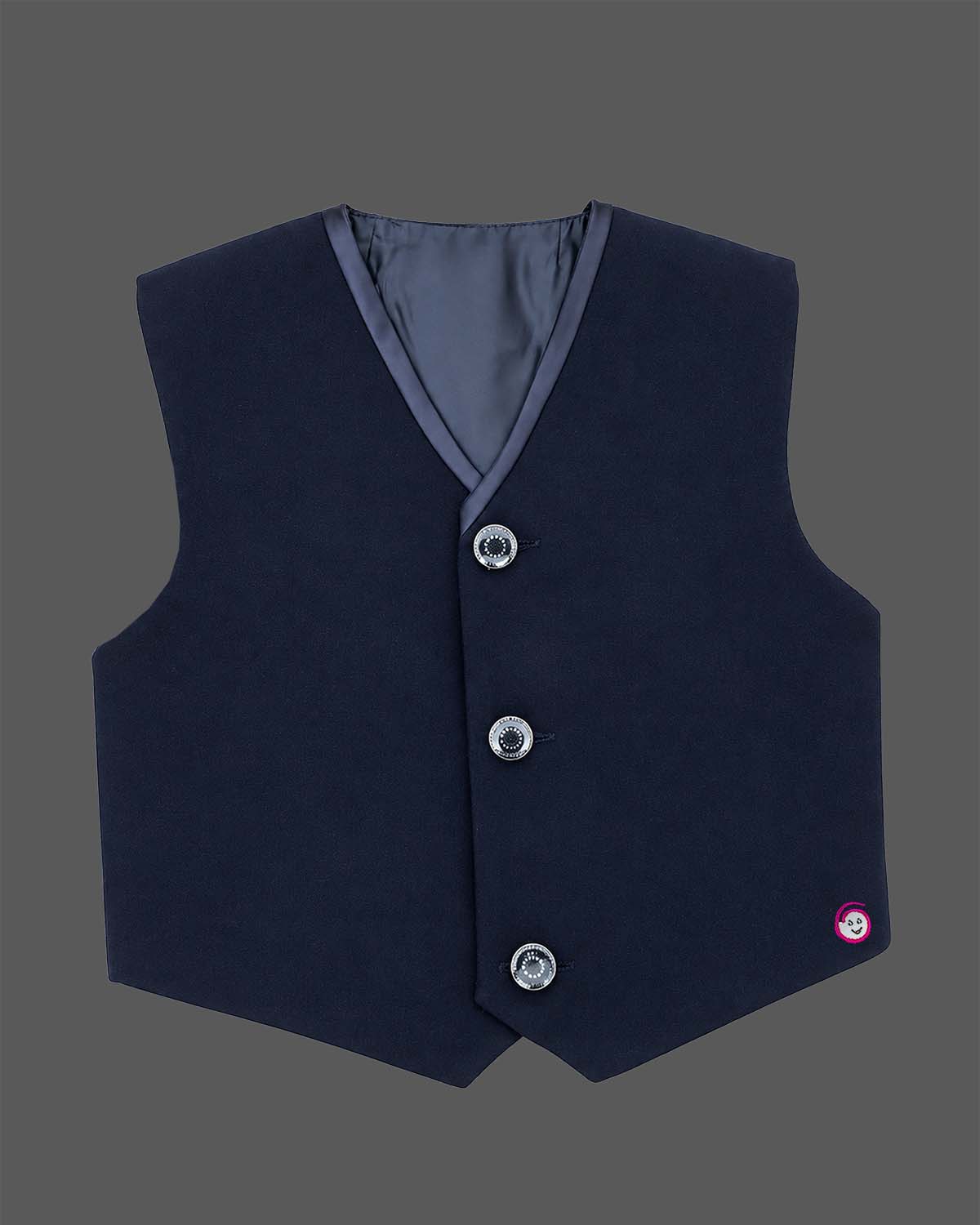 Blue boys formal suit with silver shoulder embroidery, white shirt, and bowtie
