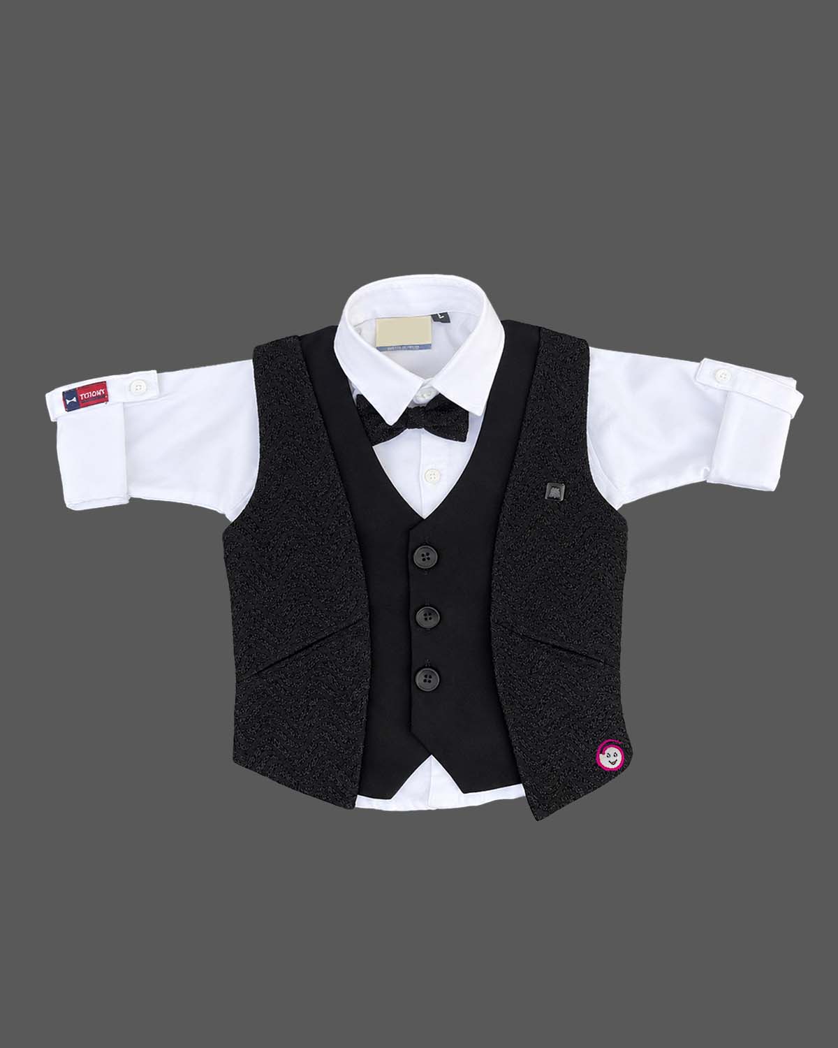 Boys textured layered waistcoat suit set with shirt, bow tie, sleeve roll-up tabs, and pant.